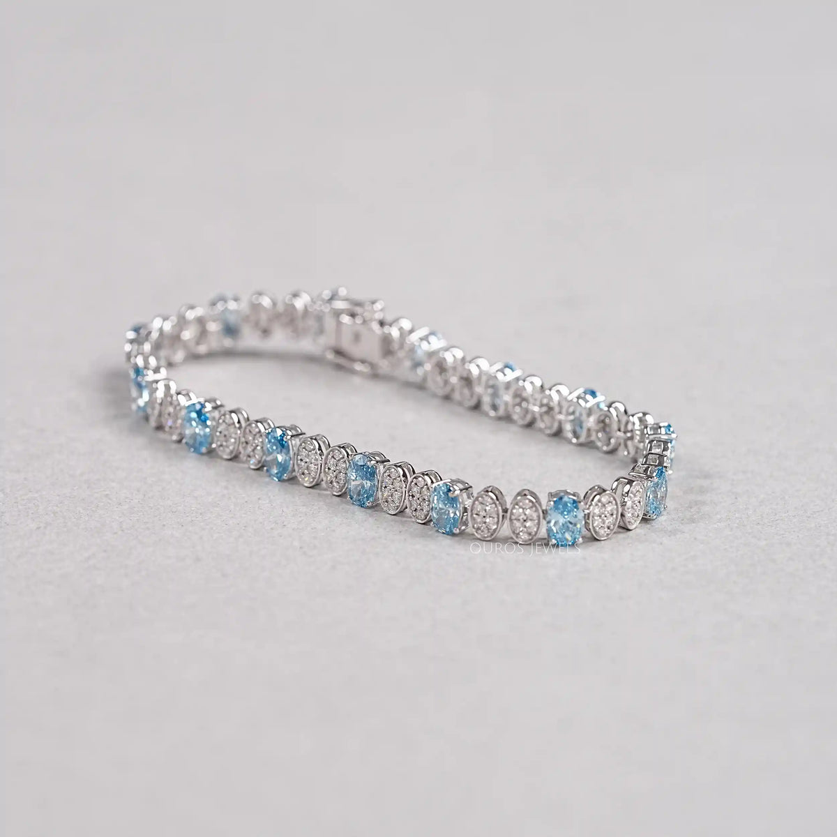 Alternating Blue Oval & Round Diamond Tennis Bracelet Bracelet