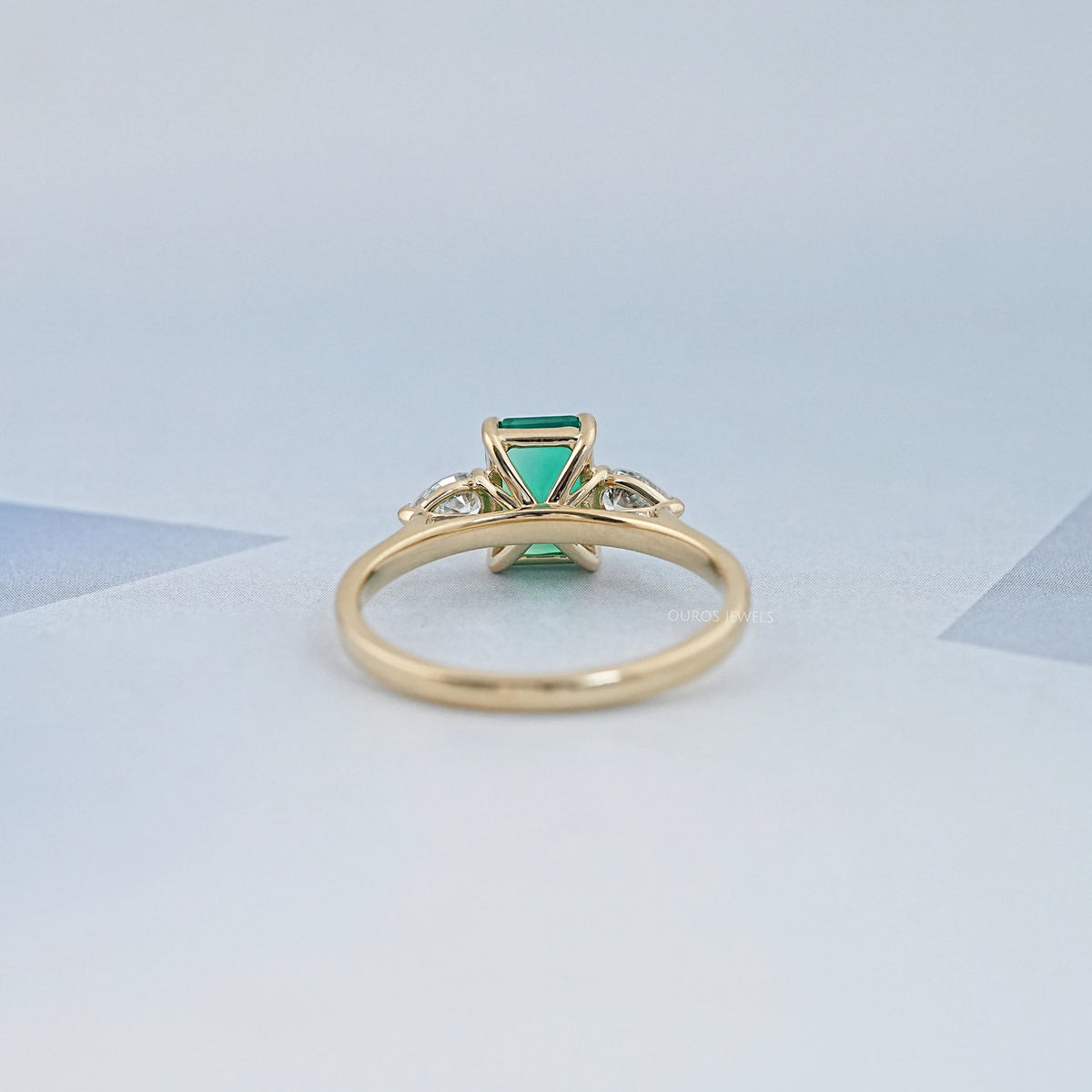 Emerald Gemstone And Pear Diamond Trio Engagement Ring Rings