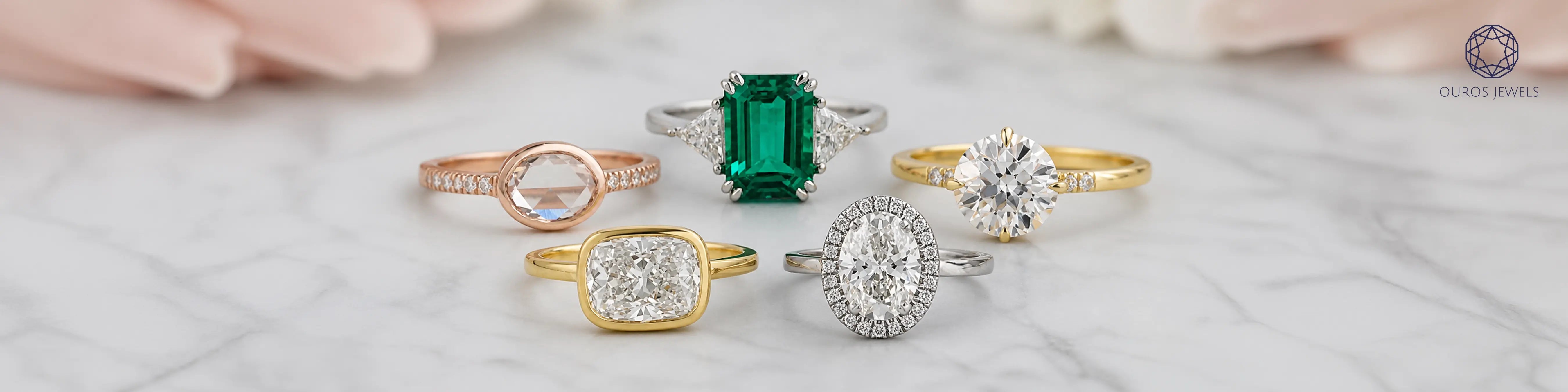 Affordable engagement rings that look expensive in lab grown diamond and emerald styles, rose gold, yellow gold, and platinum by Ouros Jewels.