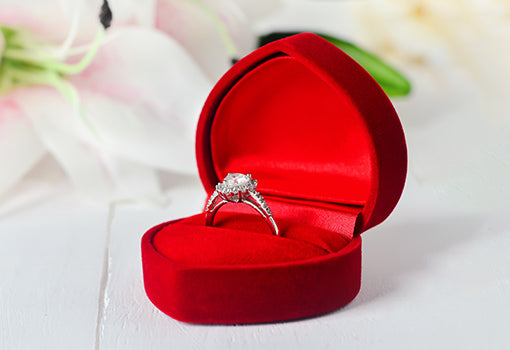 Engagement ring for women as a love sign gifted by a fiancé as proposal for wedding.