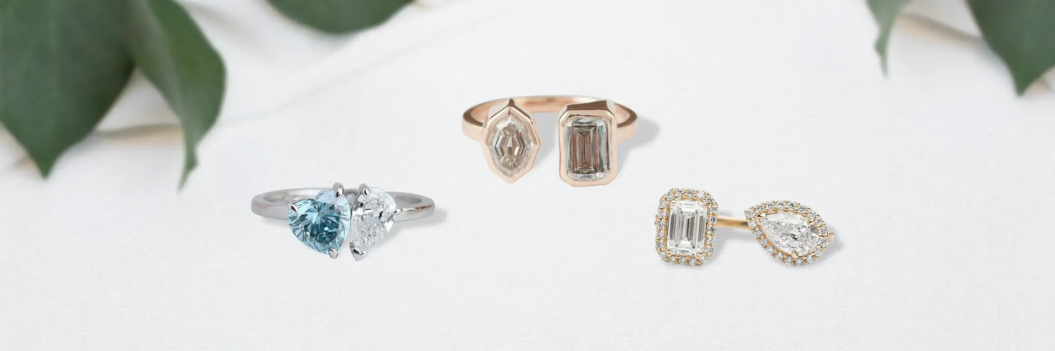 Image showing Toi et Moi ring with silver and gold metal tones, featuring two lab-grown colored diamonds set side by side in an elegant design