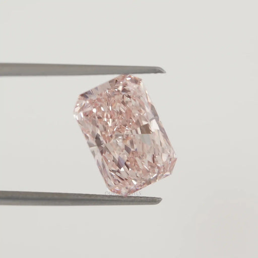 Fancy Vivid Radiant Cut Loose Diamond in a Tweezer 
