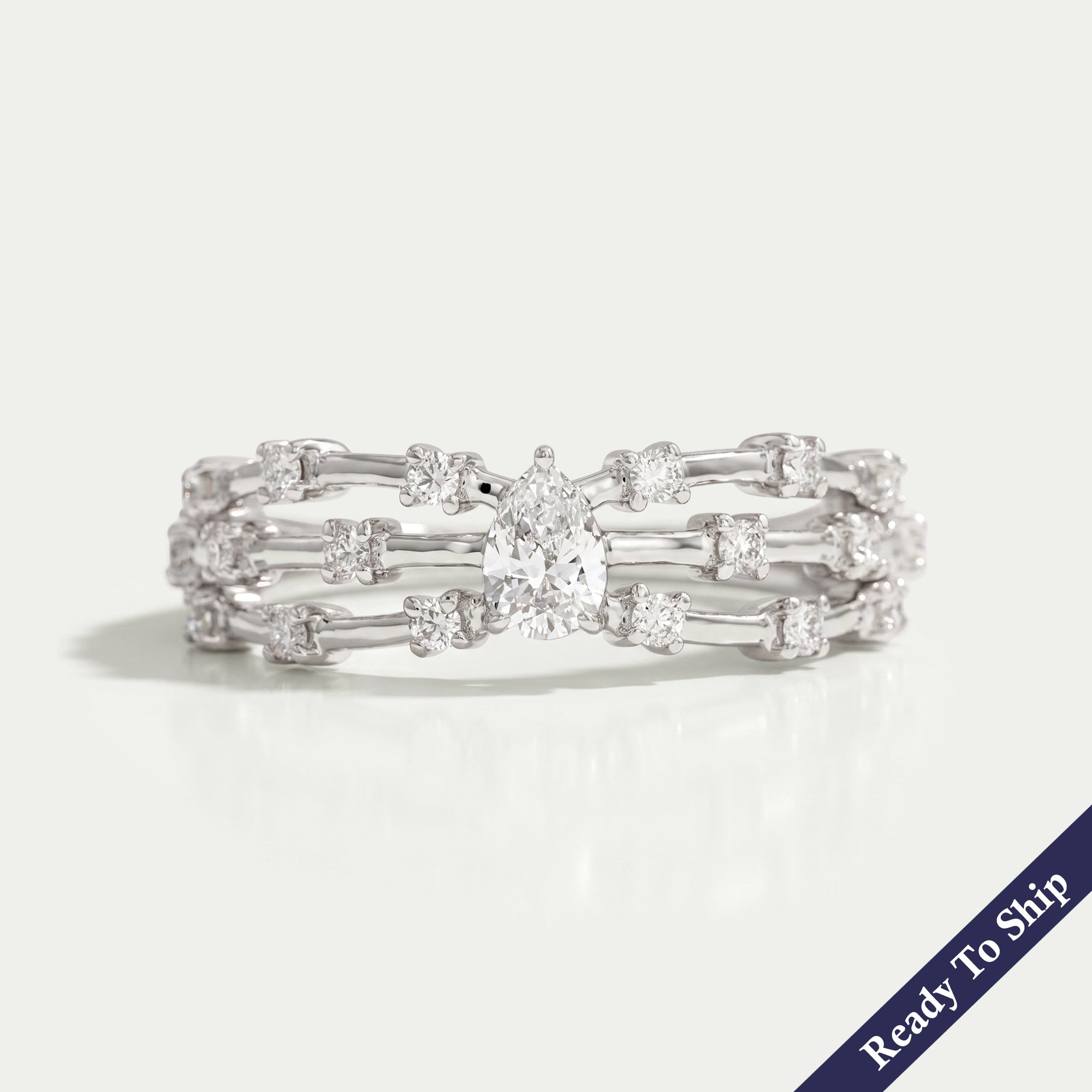 Pear Diamond Solitaire Accent Ring