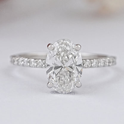 Oval Shape Solitaire With Accent Ring