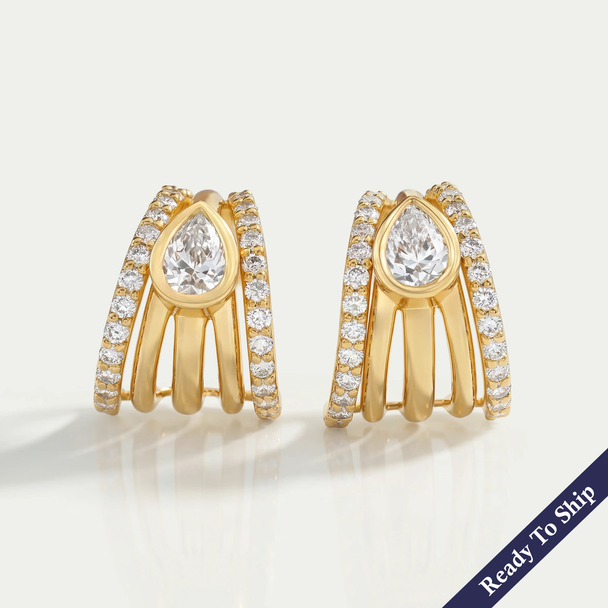 Multi Row Bezel Pear Diamond C Hoop Earrings
