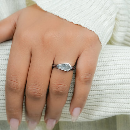East West Step Cut Shield Bezel Set Solitaire Ring