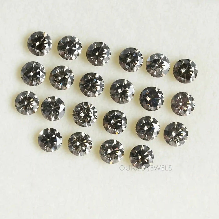 Lab created salt and 2025 pepper diamond