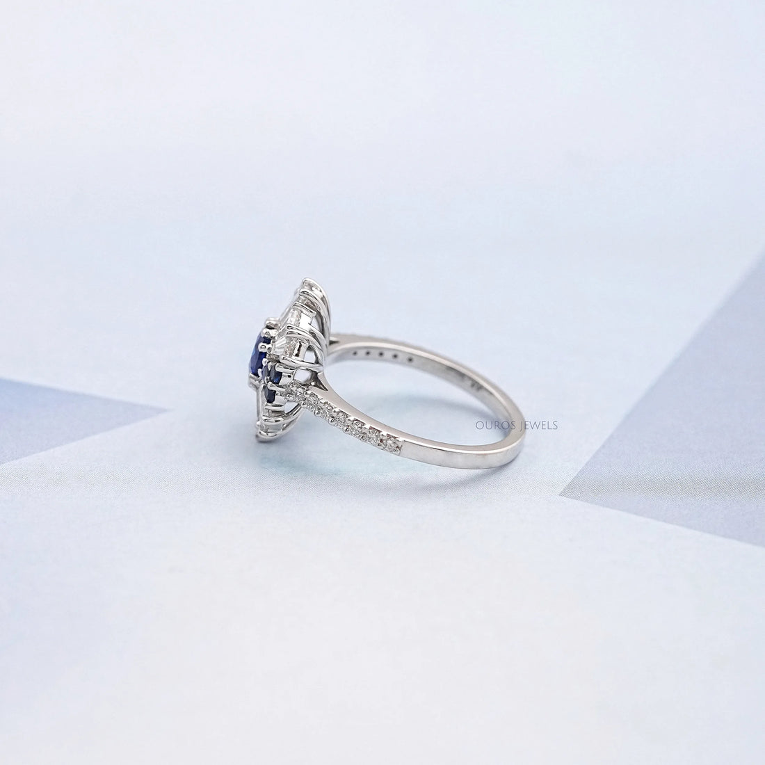 Sapphire Round And Tapered Baguette Diamond Cluster Ring