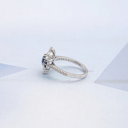 Sapphire Round And Tapered Baguette Diamond Cluster Ring