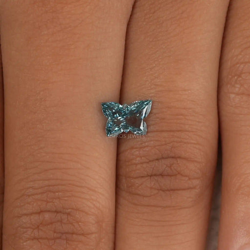 [1.15 Carat Blue Butterfly Diamond on Human Hand]-[Ouros Jewels]