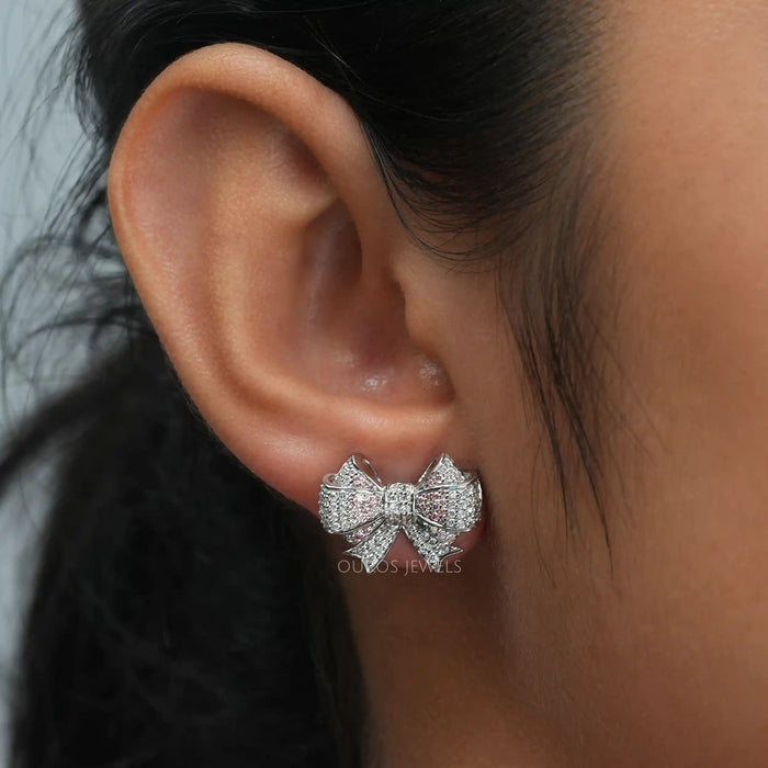 [A Women wearing Bow Style Diamond Studs]-[Ouros Jewels]