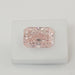 Radiant Cut Pink Certified Diamond on White Surface