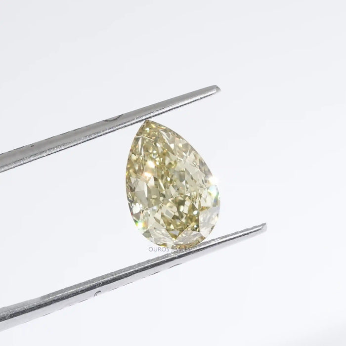 Pear Cut Fancy Intense Yellow Diamond in a Tweezer 