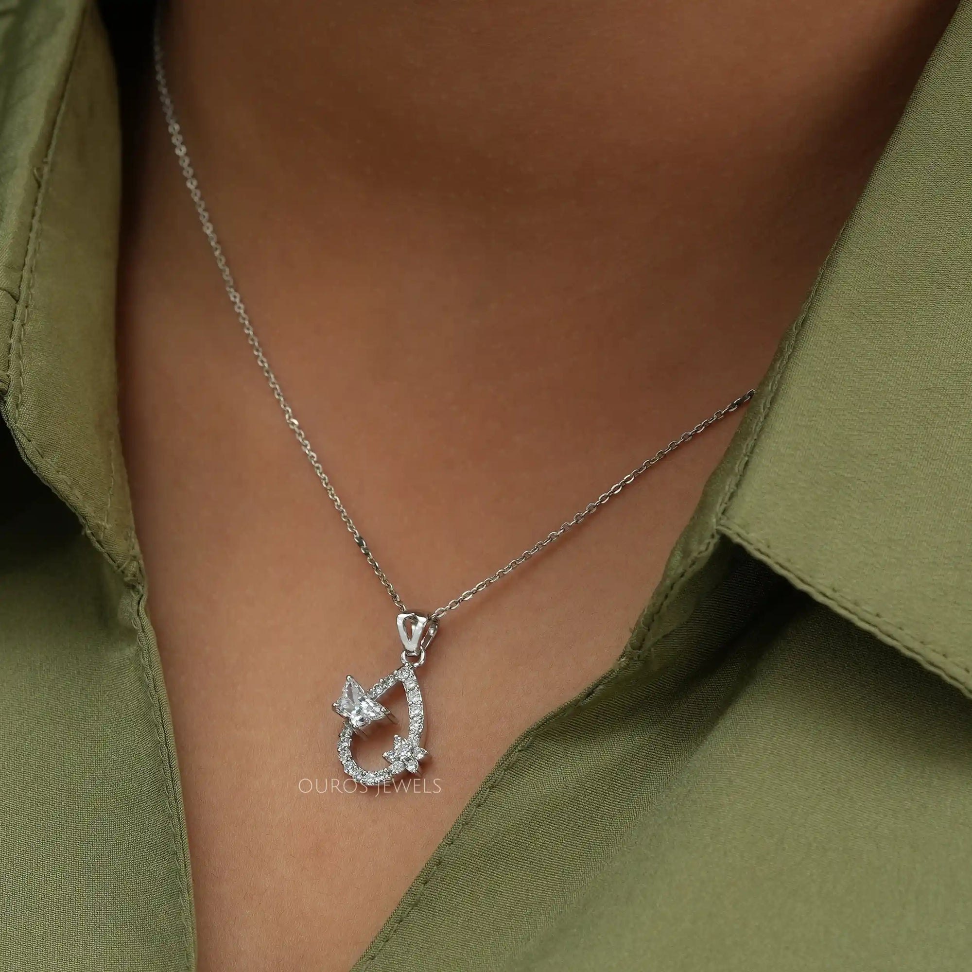 Open Pear Shaped Butterfly And Round Cut Pendant