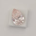 Pink Pear Certified Loose Diamond on White Surface. 