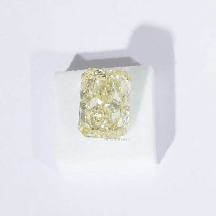 Radiant Cut Loose Diamond on White Surface 