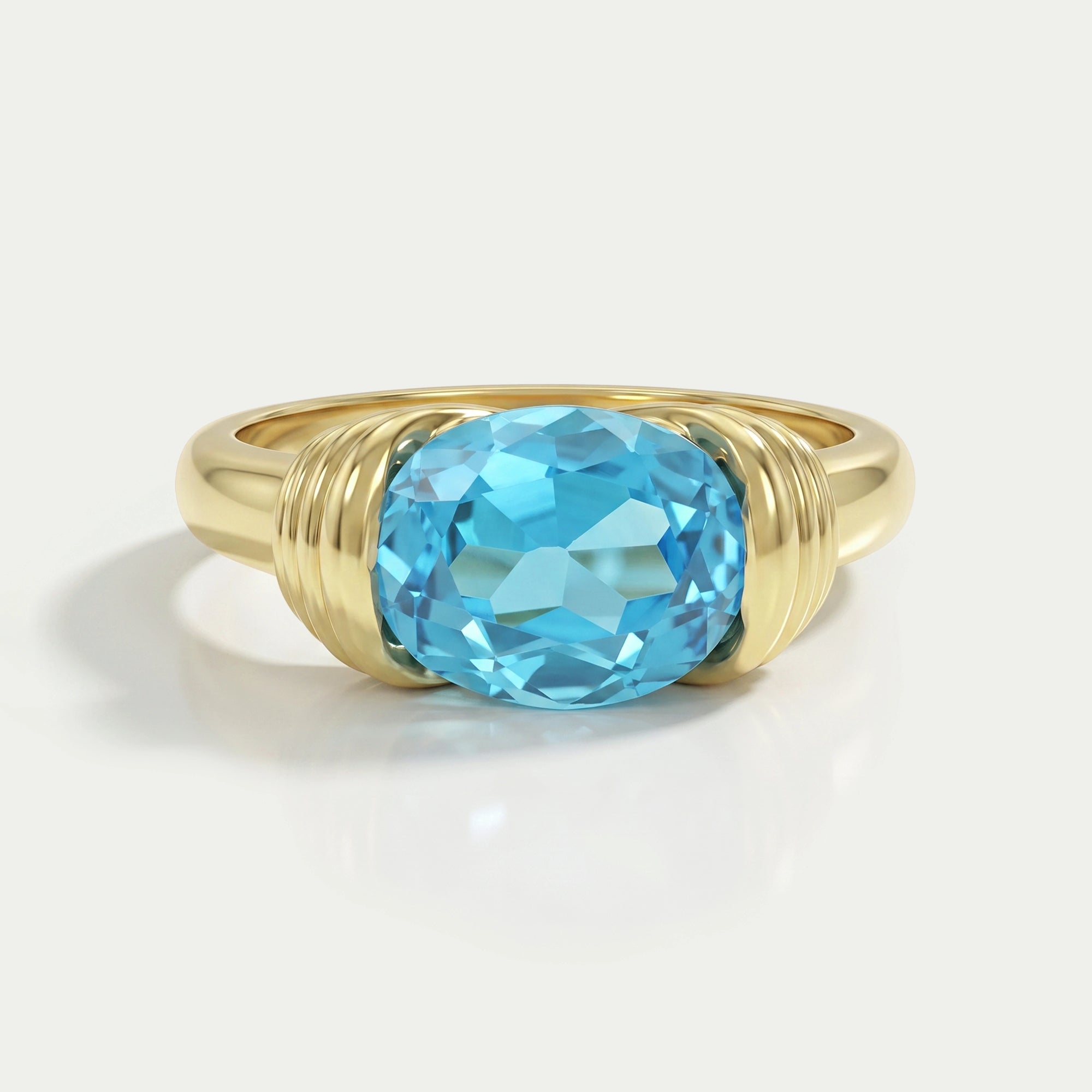 East-West Blue Oval Gemstone Solitaire Ring Rings