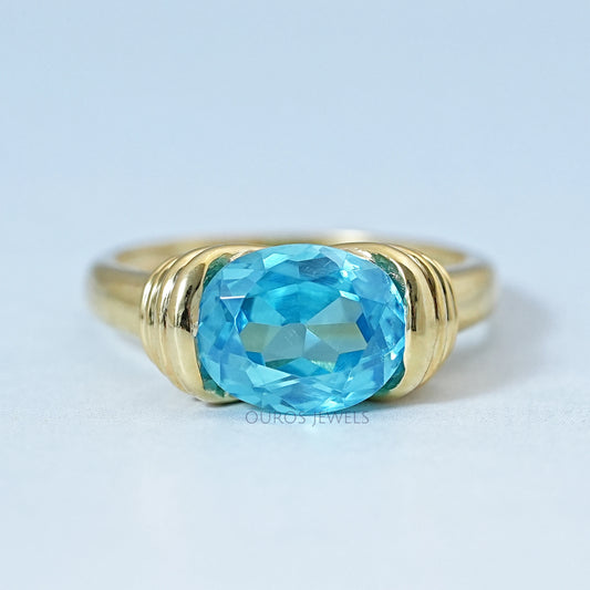 East-West Blue Oval Gemstone Solitaire Ring Rings