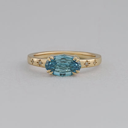 East-West Blue Step Cut Oval Accent Diamond Ring