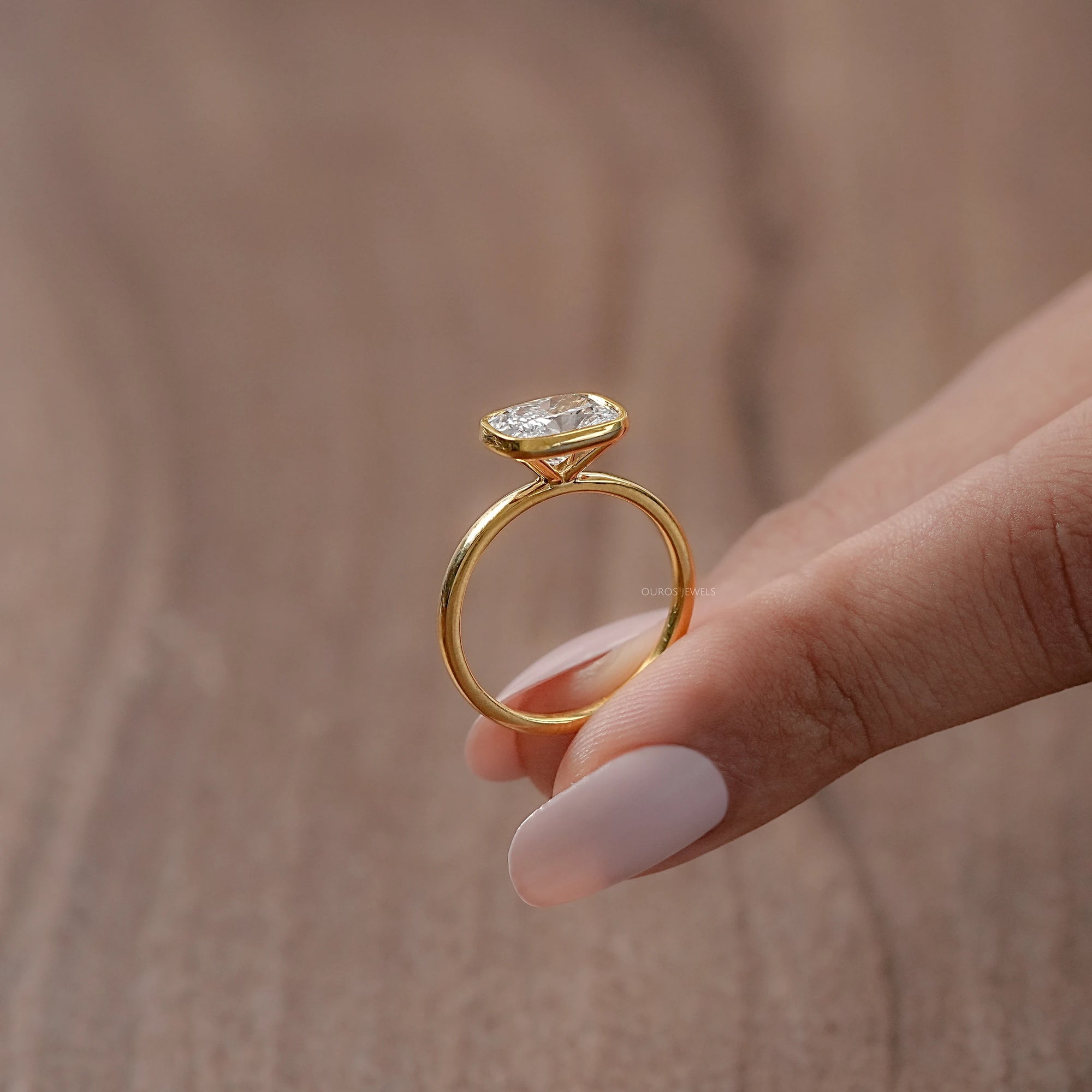 East West Cushion Diamond Bezel Set Solitaire Ring Rings