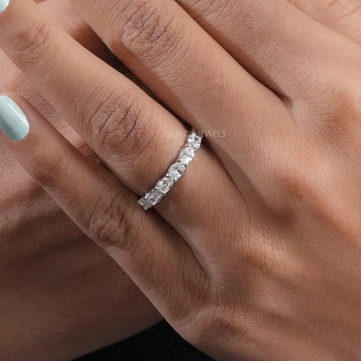 [A Women wearing East West Oval Cut Eternity Wedding Band]-[Ouros Jewels]