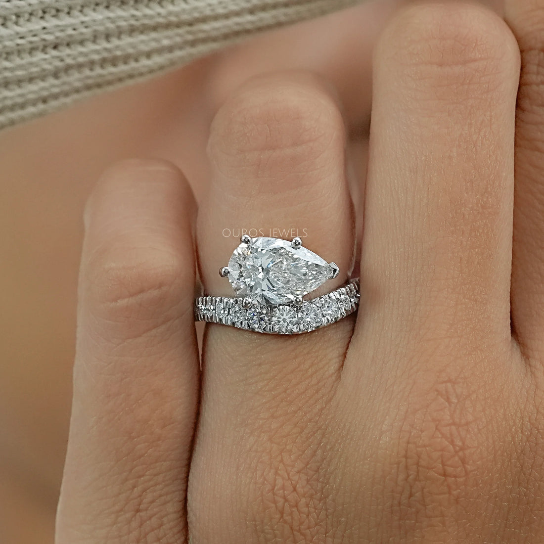 East West Pear Cut Diamond Wave Ring Ring