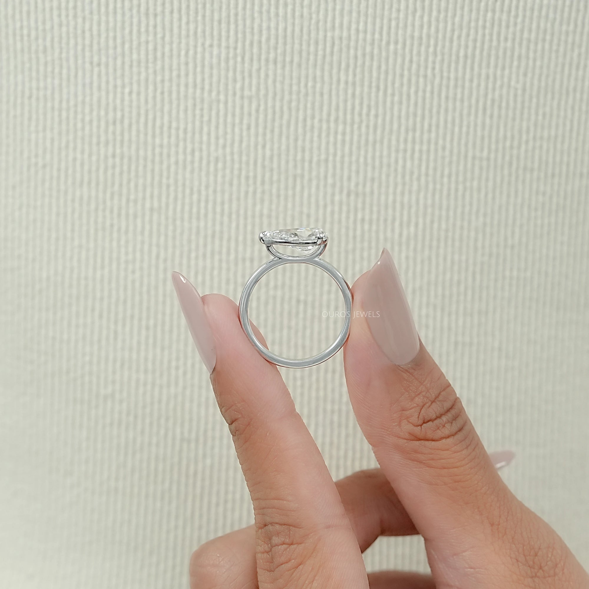 East West Pear Diamond Solitaire Engagement Ring