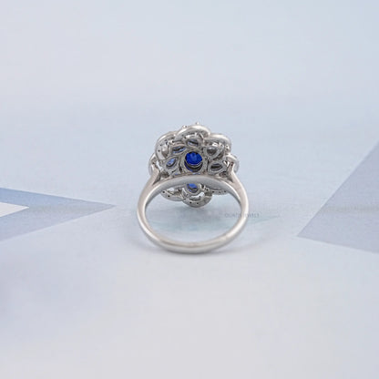 Blue Sapphire and Diamond Floral Halo Ring