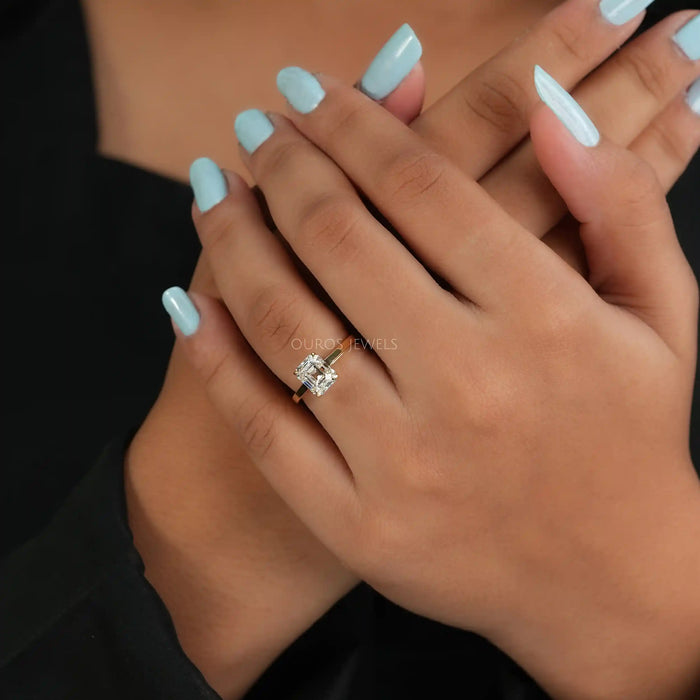 [A Women wearing Emerald Cut Solitaire Diamond Ring]-[Ouros Jewels]