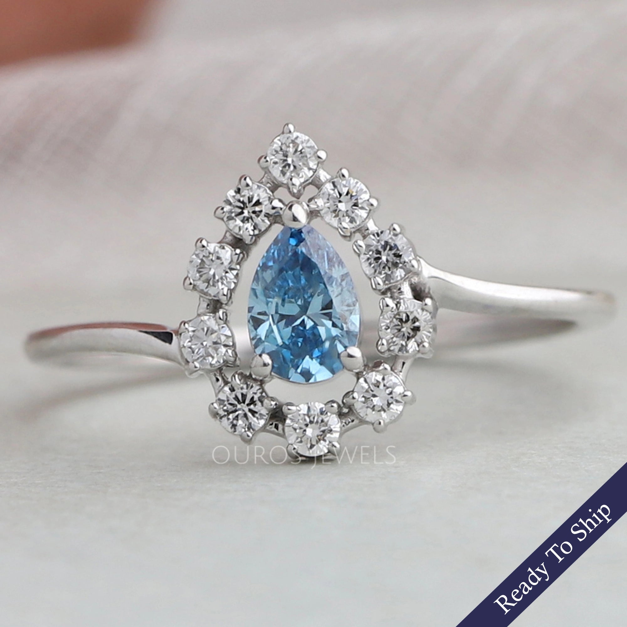 Blue Pear Cut Halo Diamond Ring
