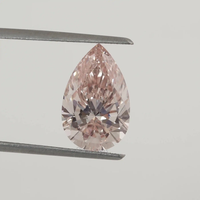 Fancy Intense Pink Pear Cut Loose Lab Grown Diamond in a Tweezer 
