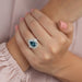 [On Finger Font View Of Fancy Vivid Blue Pear Cut Diamond With Round Diamond Halo Engagement Ring]-[Ouros Jewels]