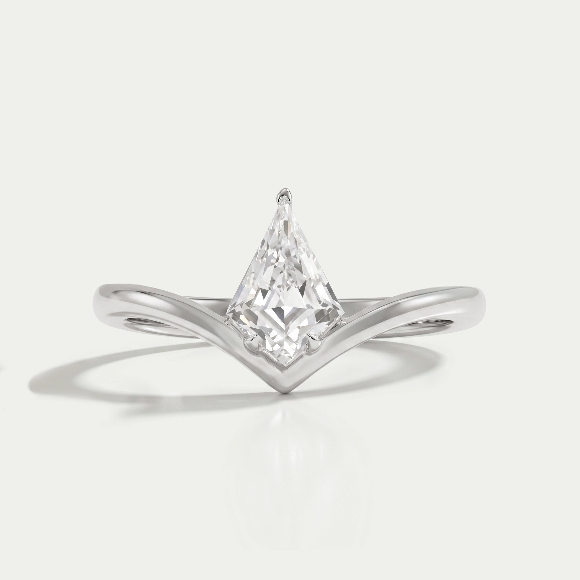 Kite Cut Curved Solitaire Engagement Ring