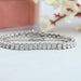 Round Cut Half Bezel Set Tennis Bracelet