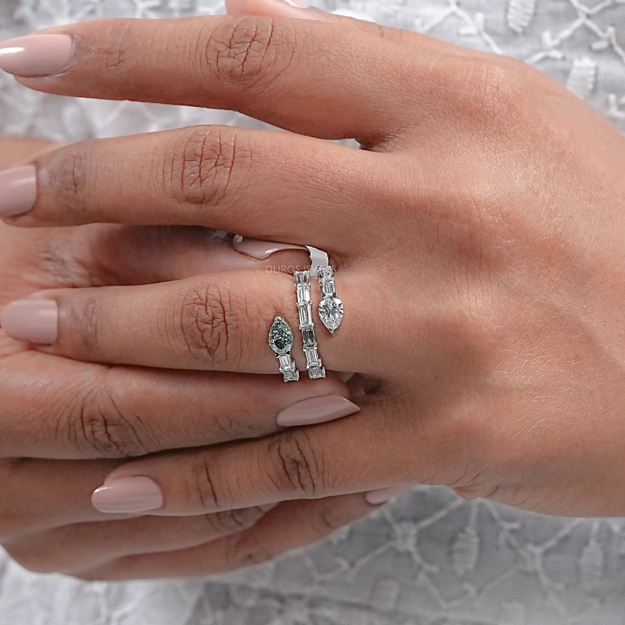 Spiral Shape Baguette And Pear Diamond Ring