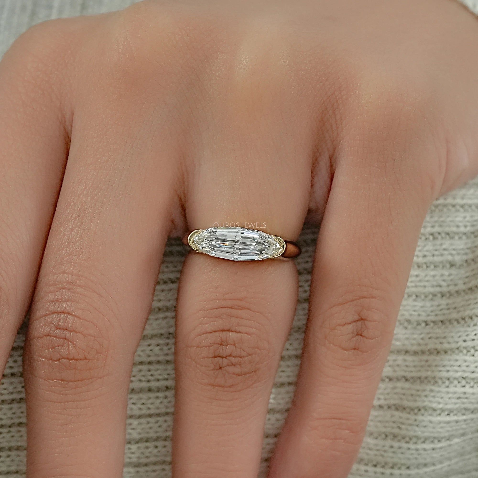 Half Bezel East West Step Cut Moval Diamond Ring Ring
