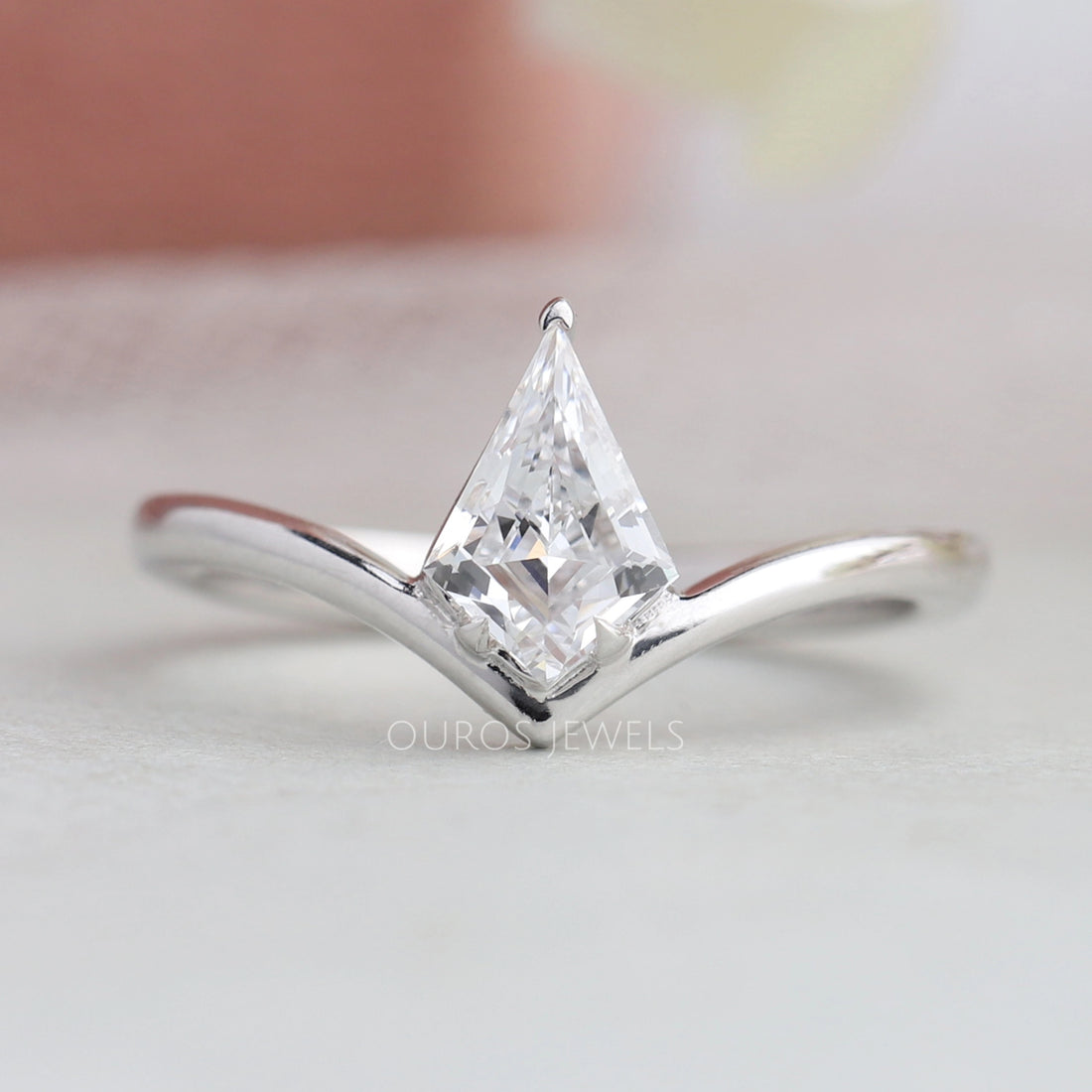 Kite Cut Curved Solitaire Engagement Ring