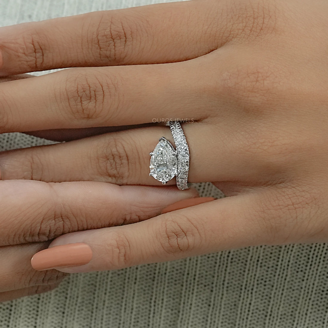 East West Pear Cut Diamond Wave Ring Ring