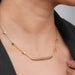 A Women wearing Zigzag Line Bar Necklace 