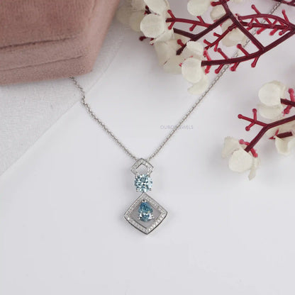 Blue Pear And Round Diamond Floating Pendant Necklaces