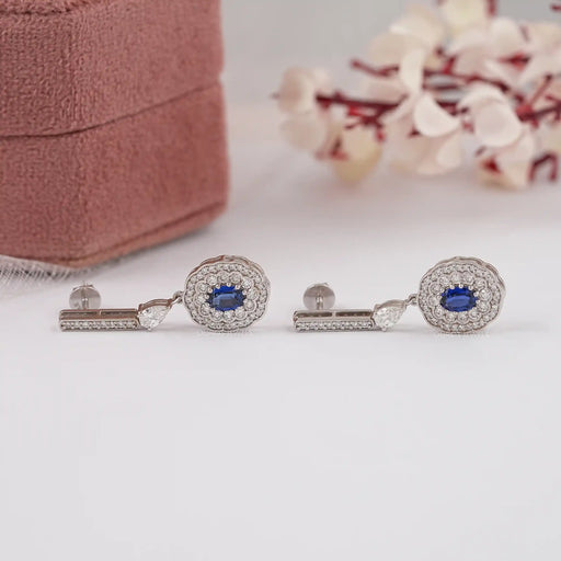 Sapphire Oval Gemstone And Double Halo Drop Earrings Earrings