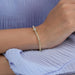 [a women wearing a lab diamond heart cut tennis bracelet]-[Ouros Jewels]