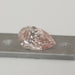 Certified Fancy Intense Pink Diamond on Pallette.