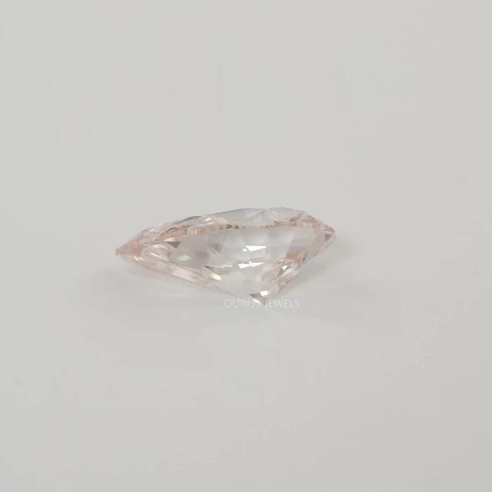 Side View of Pink Pear Lab Created Diamond on White Background.