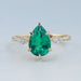 Green Pear And Kite Cut Three Stone Engagement Ring