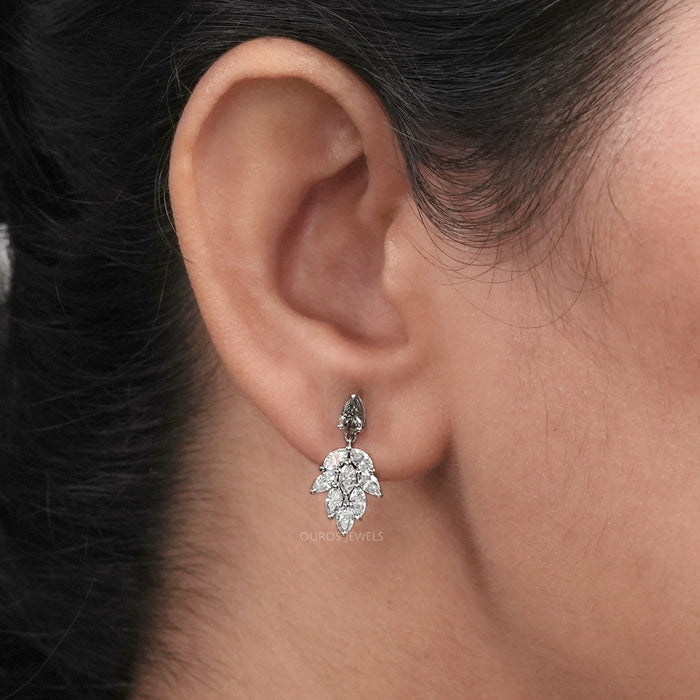 A Women Wearing Pear and Marquise Diamond Drop Earrings