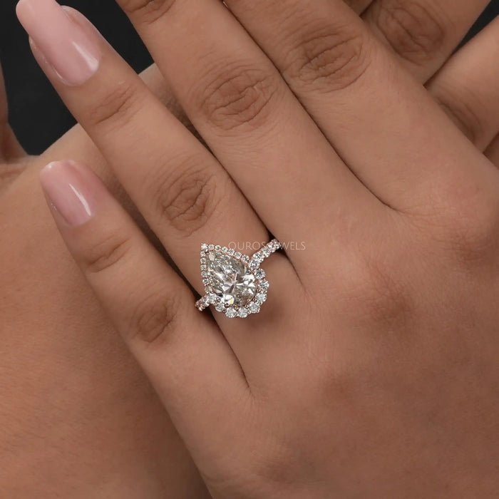 [A Women wearing Pear Cut Engagement Ring]-[Ouros Jewels]