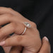 [a Women wearing Pear Cut Halo Diamond Engagement Ring]-[Ouros Jewels]