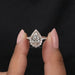 [A Women holding Pear Cut Diamond Ring]-[Ouros Jewels]