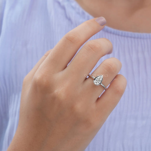 [A Women wearing Pear Shape Bezel Ring]-[Ouros Jewels]